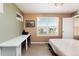 Bedroom with workstation, window and views, and ample natural light at 3661 S Perth Cir # 6-101, Aurora, CO 80013