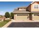 Inviting exterior of multi-unit home with well-maintained landscaping and garage at 3661 S Perth Cir # 6-101, Aurora, CO 80013