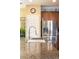 Granite countertop with stainless steel sink, faucet, and stainless steel fridge at 3661 S Perth Cir # 6-101, Aurora, CO 80013