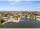 Expansive aerial view of a lake community with private beaches, docks, and serene natural surroundings at 12648 Waterside Ln, Longmont, CO 80504