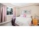 Relaxing bedroom with a plush bed, bedside tables, and soft lighting at 12648 Waterside Ln, Longmont, CO 80504