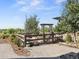 The backyard garden is fenced and includes a stone patio; a great space for growing your own food at 12648 Waterside Ln, Longmont, CO 80504