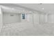 Spacious finished basement with new carpet, recessed lighting, and neutral paint at 7470 S Steele Cir, Centennial, CO 80122