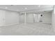 Spacious finished basement featuring neutral paint, carpet, and recessed lighting at 7470 S Steele Cir, Centennial, CO 80122