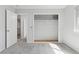 Bright bedroom featuring a spacious closet, neutral paint, and sunlight at 7470 S Steele Cir, Centennial, CO 80122
