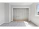 Bedroom featuring a walk-in closet with custom shelving and neutral paint at 7470 S Steele Cir, Centennial, CO 80122