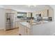 Bright kitchen with granite countertops, stainless steel appliances, and ample cabinet space for storage at 7470 S Steele Cir, Centennial, CO 80122