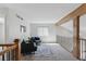 Loft area with cozy seating and a large window at 7470 S Steele Cir, Centennial, CO 80122