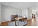 Functional home office with a wooden desk, ample storage, and hardwood floors, perfect for remote work at 7470 S Steele Cir, Centennial, CO 80122