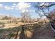Picturesque walking path alongside a creek and through trees, offering a serene natural escape at 7470 S Steele Cir, Centennial, CO 80122