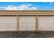 A row of well maintained community garages offering secure parking for residents at 1454 Jersey St # 104, Denver, CO 80220