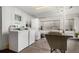 Onsite laundry room with modern washing machines, dryers, and utility sink for resident's convenience at 1454 Jersey St # 104, Denver, CO 80220