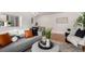 Inviting living room with modern decor, comfortable seating, and stylish accents at 1454 Jersey St # 104, Denver, CO 80220