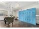 Community storage area with lockers, utility sink, and bright lighting for residents' storage needs at 1454 Jersey St # 104, Denver, CO 80220