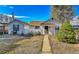 Charming single-story home with a well-defined pathway and a neatly maintained front yard at 2171 S Cherokee St, Denver, CO 80223