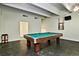 Spacious game room with a pool table, offering entertainment and leisure space at 7877 E Mississippi Ave # 208, Denver, CO 80247