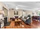 Comfortable living room with fireplace, plenty of light, and multiple sofas at 7877 E Mississippi Ave # 208, Denver, CO 80247