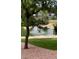 A peaceful pond with a fountain and landscaped surroundings, enhancing the community's appeal at 7877 E Mississippi Ave # 208, Denver, CO 80247