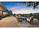 Spacious outdoor deck with comfortable seating, and stunning mountain views at 187 Marion Dr, Evergreen, CO 80439
