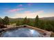 Scenic hot tub offers relaxation with amazing views at 187 Marion Dr, Evergreen, CO 80439