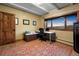 Comfortable office featuring mountain views, wood accents, an area rug, and natural light at 187 Marion Dr, Evergreen, CO 80439