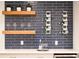 Close up of a stylish bar area with blue backsplash, wood shelving, and sleek counterspace at 1117 S Madison St, Denver, CO 80210