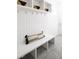 Stylish mudroom features a built-in bench and storage cabinets at 1117 S Madison St, Denver, CO 80210