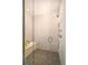 Contemporary shower with a glass door, built-in bench, and stylish tile design at 1117 S Madison St, Denver, CO 80210