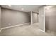 Finished basement area with carpeted flooring and neutral wall color at 10567 Dartmouth, Lakewood, CO 80227