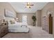 Serene main bedroom with plush carpeting, neutral tones, and plenty of natural light at 10567 Dartmouth, Lakewood, CO 80227