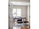 Bright home office featuring a desk, comfortable stools, and natural light at 4530 S Verbena St # 316, Denver, CO 80237