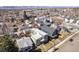 Stunning aerial view of modern homes nestled in a vibrant community, with mountain views at 4351 Yates St, Denver, CO 80212