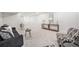 Finished basement with neutral carpet, contemporary furniture, and ample space for living and entertaining at 4351 Yates St, Denver, CO 80212