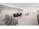 Finished basement featuring modern furniture, carpeted floors, and a versatile open layout at 4351 Yates St, Denver, CO 80212