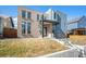 Modern two-story home featuring a combination of brick and sleek siding at 4351 Yates St, Denver, CO 80212
