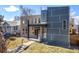 Contemporary-style two-story home showcasing unique design and a well-maintained front yard at 4351 Yates St, Denver, CO 80212