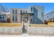 Contemporary home showcasing a stylish facade, front yard, and eye-catching architectural details at 4351 Yates St, Denver, CO 80212