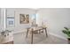 Cozy home office with a wooden desk, neutral decor, and ample natural light at 4351 Yates St, Denver, CO 80212