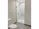 Bathroom features walk-in shower with glass door and white subway tile at 603 Inca St # 429, Denver, CO 80204
