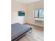 Cozy bedroom featuring a comfortable queen-sized bed, AC unit, and window with a view at 603 Inca St # 429, Denver, CO 80204
