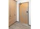 Entryway features a modern door, ample closet space, and sleek flooring at 603 Inca St # 429, Denver, CO 80204