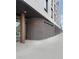 Modern apartment building exterior showcasing architectural brick and a prominent building name at 603 Inca St # 429, Denver, CO 80204