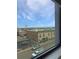 City view from a window of the streets below and clear blue skies at 603 Inca St # 429, Denver, CO 80204