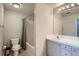 Bathroom featuring a shower and tub combination and a large vanity sink at 7440 S Blackhawk St # 4-102, Englewood, CO 80112