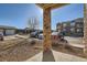 Exterior view of the apartment homes with visible parking and landscaping around the property at 7440 S Blackhawk St # 4-102, Englewood, CO 80112
