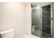 Bathroom featuring a walk-in shower and modern fixtures at 8022 W 78Th Way, Arvada, CO 80005