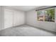 Bedroom featuring a closet and a window with natural light at 8022 W 78Th Way, Arvada, CO 80005