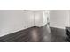 Open living space boasting sleek hardwood floors, neutral paint, and modern fixtures at 8022 W 78Th Way, Arvada, CO 80005