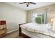 Comfortable bedroom with neutral walls and soft carpet, perfect for relaxation at 9963 E Carolina Cir # 104, Aurora, CO 80247