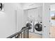 Convenient laundry room with modern appliances and plenty of storage at 4238 Zuni St, Denver, CO 80211